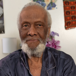 Bryant, an older African-American man, receives meals on wheels from Citymeals in his NYC apartment