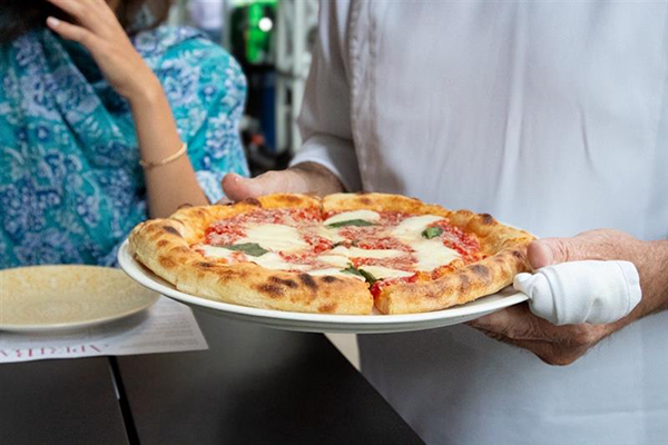 Pizza from Chef Charlie Palmer's Aperibar in Manhattan in support of Citymeals on Wheels. 