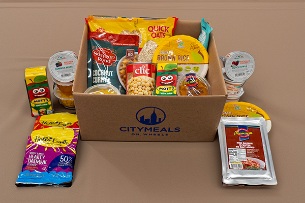 Citymeals' Emergency Food Packages containing pantry staples. 