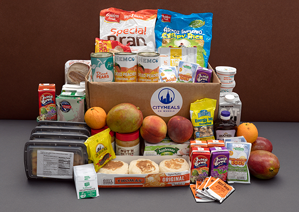 Citymeals' breakfast boxes containing 30 days of meals and pantry staples.