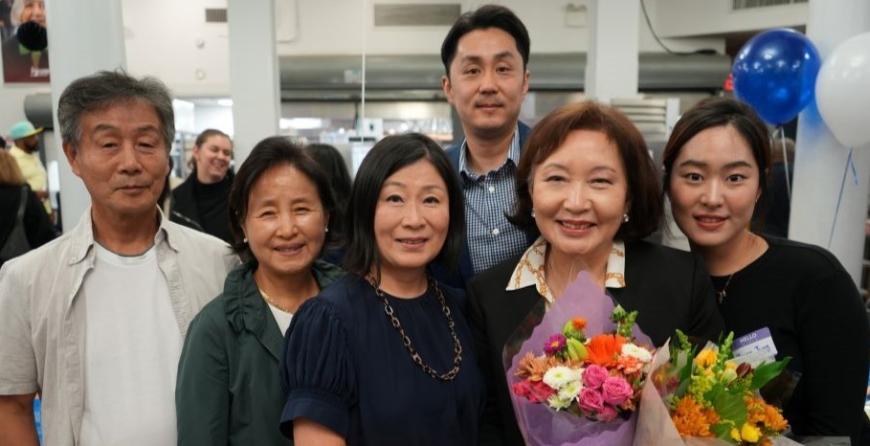 Members of the KCS team pose with award-winner Younghee Song Kim.